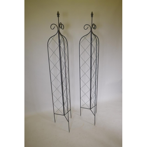 1176 - A pair of trefoil folding metal plant towers with lattice design, 180cm high