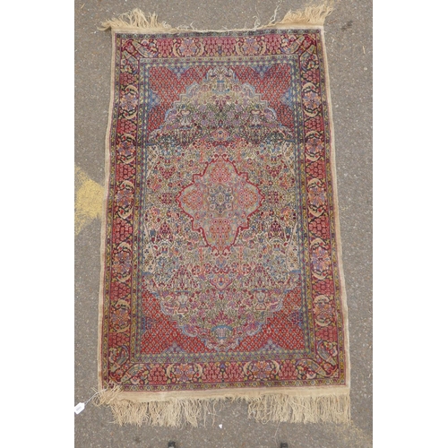 1191 - A Persian multi colour Heriz design silk rug, wear, 38½