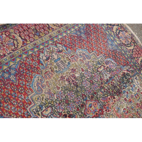 1191 - A Persian multi colour Heriz design silk rug, wear, 38½