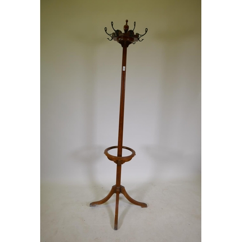 1197 - A Victorian walnut hat stand with fluted details and four splayed supports, AF, 76