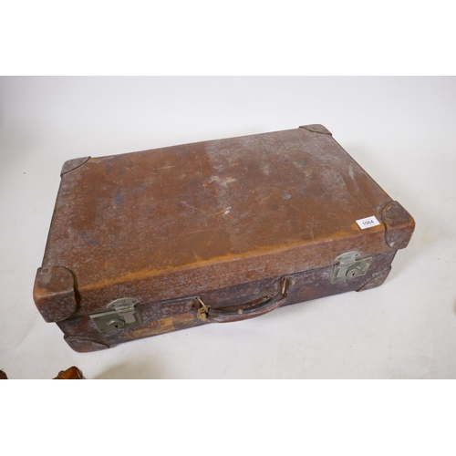 1200 - A vintage leather suitcase by R.W. Forsyth, a smaller leather case and an attache case, 26