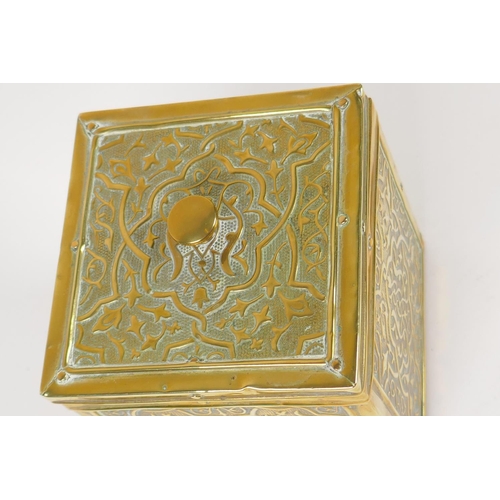 14 - A Chinese embossed brass cased square section tea caddy with metal liner, 10.5cm square