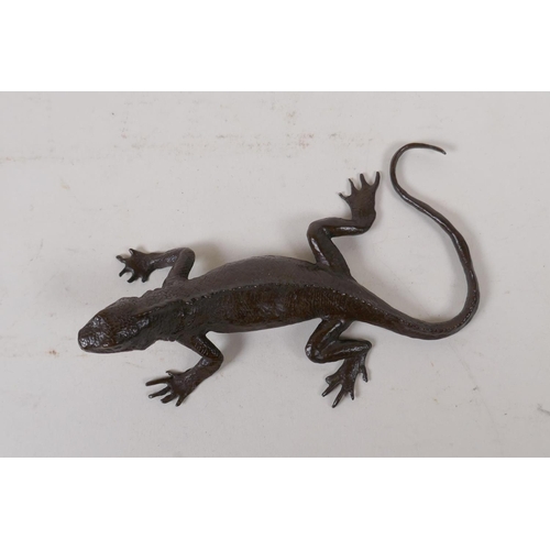 18 - A Japanese style bronze okimono lizard, mark to base, 13cm long