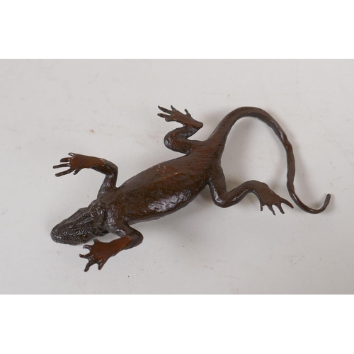 18 - A Japanese style bronze okimono lizard, mark to base, 13cm long