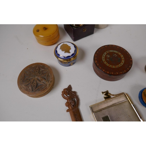 22 - A collection of vintage treen trinket boxes, ink pots, vesta cases, and a Kashmiri scribe's box, lar... 