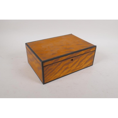 26 - A C19th satinwood and ebony inlaid jewellery box, 25 x 17 x 9cm, a jewellery box and a marquetry inl... 