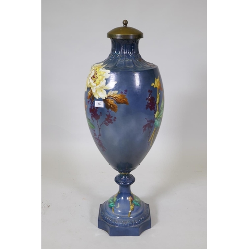 30 - A continental ceramic urn with floral decoration, stamped Bonn, Germany to base, 85cm high