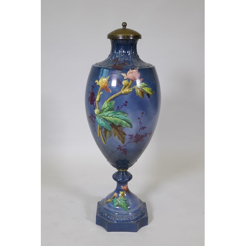 30 - A continental ceramic urn with floral decoration, stamped Bonn, Germany to base, 85cm high