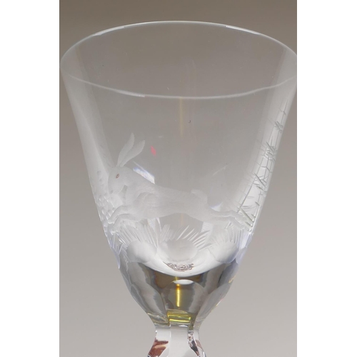 41 - A set of six late C19th sherry glasses with etched decoration of forest animals, 13cm high