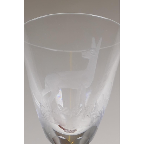 41 - A set of six late C19th sherry glasses with etched decoration of forest animals, 13cm high