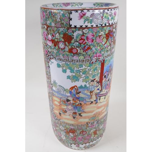 43 - A famille rose pattern Chinese porcelain cylindrical stick stand, 47cm high