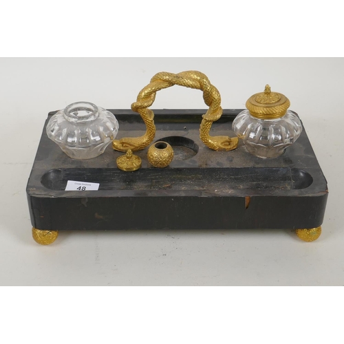 48 - C19th ebonised desk stand with ormolu handle in the form of a serpent, AF losses, 35 x 21 x 15cm