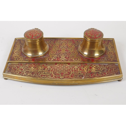 5 - An embossed and lacquered brass boule style desk inkwell, 27cm wide