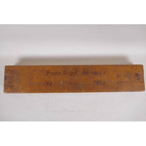 51 - A vintage wood cigar press, inscribed Franz Geiger Oberweier, No 143, dated 1953, with 20 compartmen... 