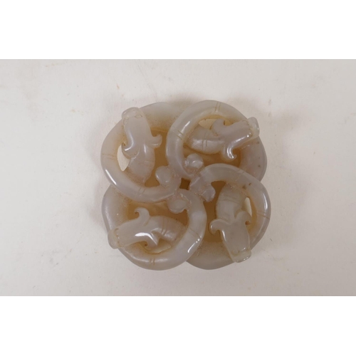 58 - A Chinese grey jade pendant carved in the form of entwined dragons, 5cm x 5cm