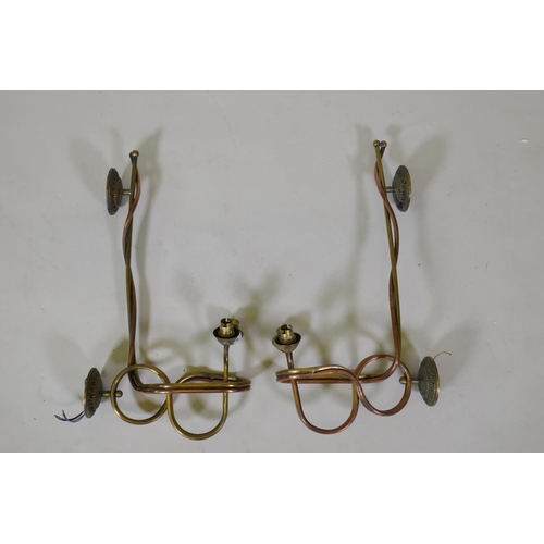 62 - A pair of brass and copper two light wall sconces, 31cm deep x 56cm high