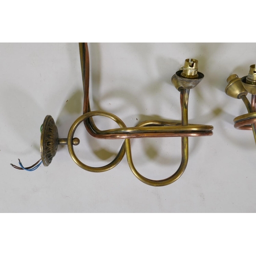 62 - A pair of brass and copper two light wall sconces, 31cm deep x 56cm high