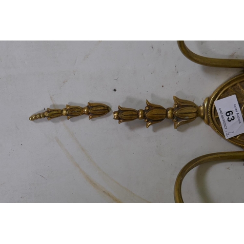 63 - A neo classical style brass two branch wall sconce, AF, 46cm long and another three branch