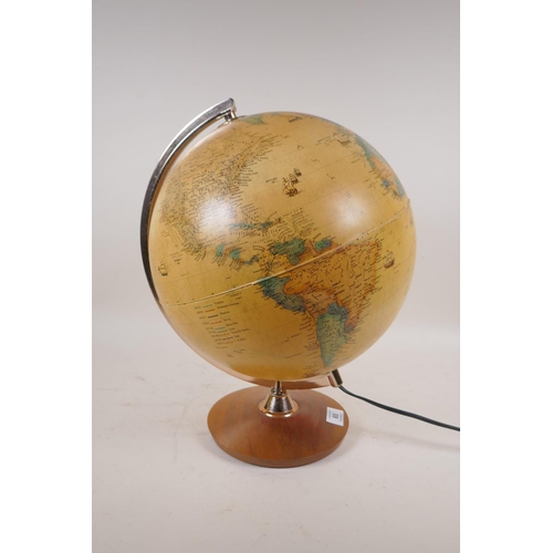 65 - An illuminated terrestrial globe, 40cm high