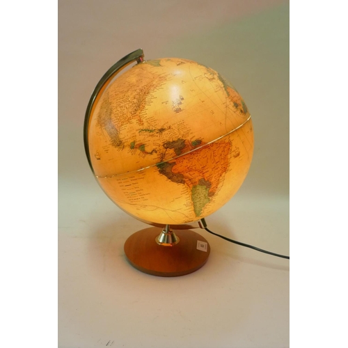 65 - An illuminated terrestrial globe, 40cm high