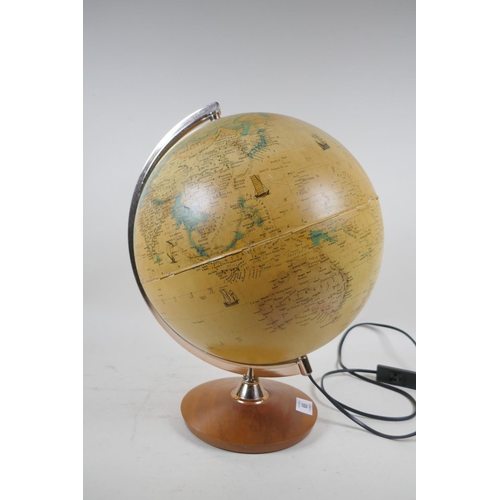 65 - An illuminated terrestrial globe, 40cm high