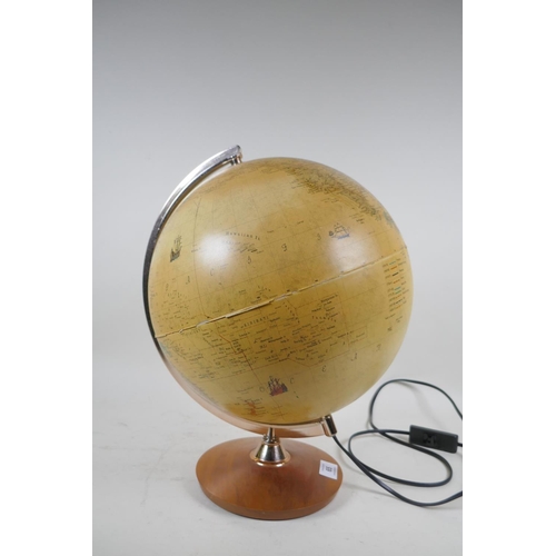 65 - An illuminated terrestrial globe, 40cm high