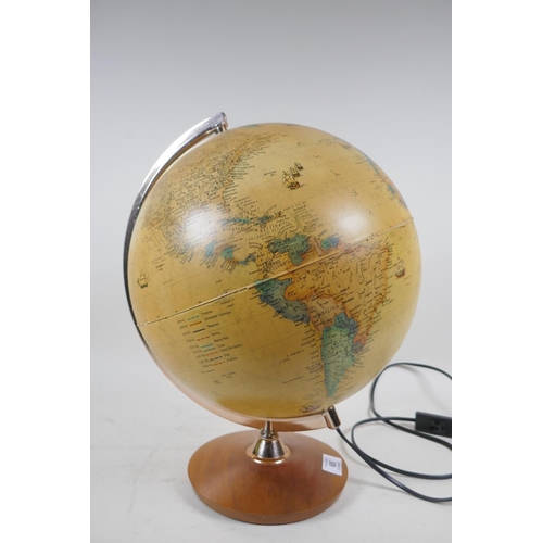 65 - An illuminated terrestrial globe, 40cm high