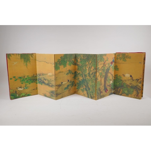 66 - A Chinese printed concertina book depicting Asiatic birds in the natural habitats, with embroidered ... 