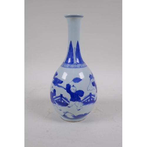 1 - A C19th blue and white porcelain bottle vase decorated with boys playing, Chinese Qianlong 6 charact... 