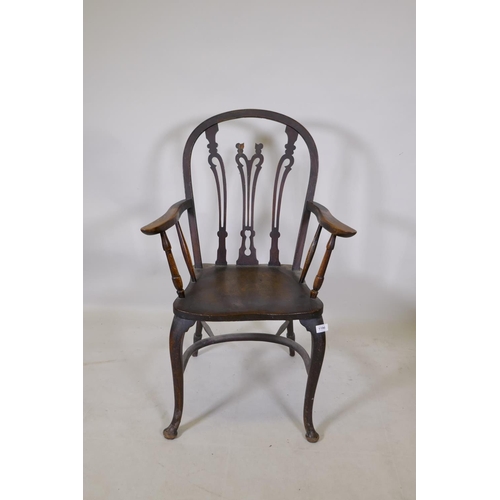 1196 - A Georgian style beechwood hoop back elbow chair with pierced splats and crinoline stretcher, AF