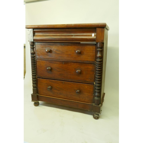 1203 - A Victorian mahogany Scotch chest with moulded frieze drawer over three more, flanked by turned colu... 