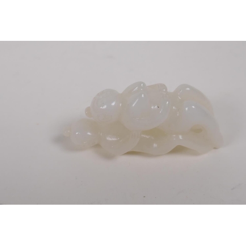 15 - A Chinese carved white jade erotic pendant, 6cm long