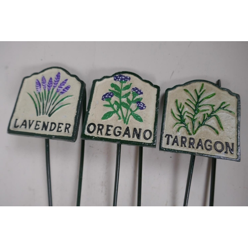 22 - A set of six painted iron herb markers, 27cms long