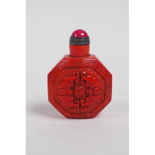 28 - A Peking glass snuff bottle with raised bat decoration, 6cm high