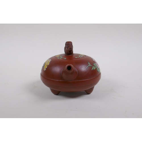 35 - A Chinese YiXing teapot with polychrome enamel floral decoration, marks to base, 12cm diameter