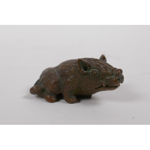 65 - A Japanese bronze okimono boar, 5cm long