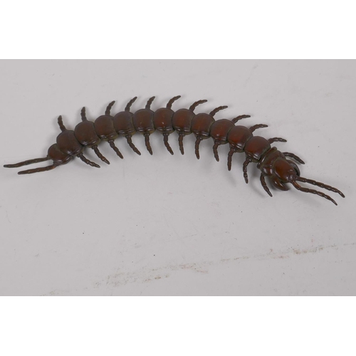 82 - An oriental bronze okimono formed as an articulated centipede, 15cm long