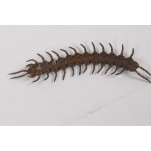 82 - An oriental bronze okimono formed as an articulated centipede, 15cm long