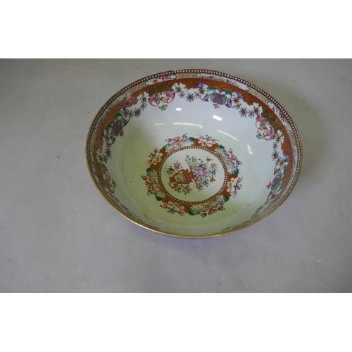 3 - A C19th Chinese export rose mandarin punch bowl, AF, broken, repaired, 33cm diameter