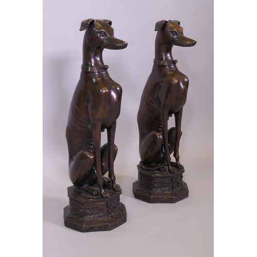 103 - A large pair of bronze greyhounds seated on octagonal plinths, in the manner of Alfred Barye, 74cm h... 