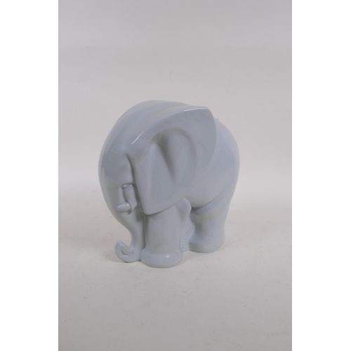 106 - A Spode Copeland onyx ware porcelain figure of an elephant, stamped K446, 20cm high