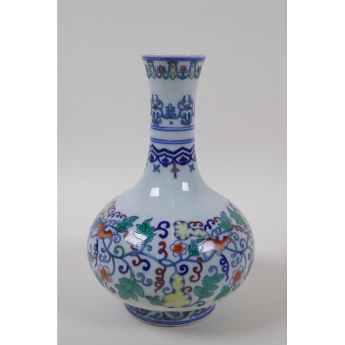 118 - A Doucai porcelain bottle vase with bat and gourd vine decoration, Chinese Qianlong seal mark to bas... 