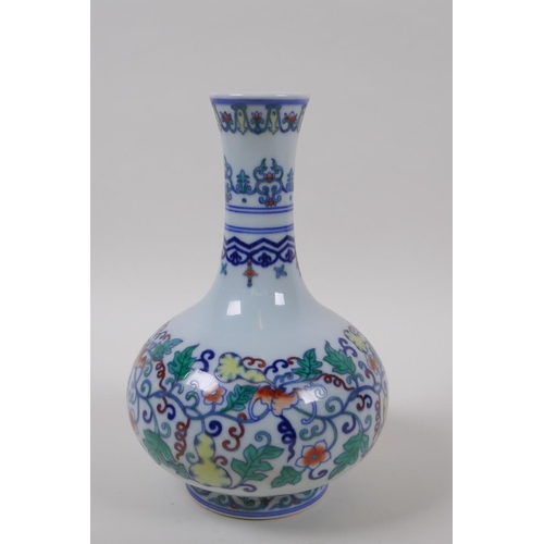 118 - A Doucai porcelain bottle vase with bat and gourd vine decoration, Chinese Qianlong seal mark to bas... 