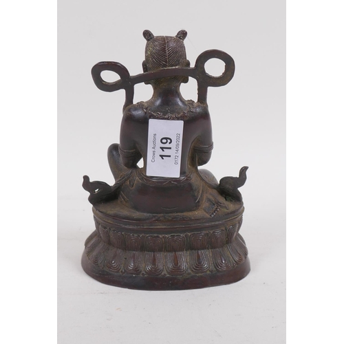 119 - A bronze Buddha seated upon a stylised lotus throne, 16cm high