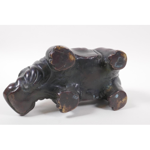 123 - A Chinese filled bronze hippo, 21cm long