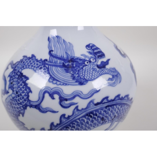 133 - A blue and white porcelain vase decorated with a dragon in flight, Chinese Xuande 6 character mark t... 