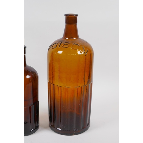 136 - Two vintage brown ribbed glass poison bottles and a similar green glass bottle, largest 39cm high