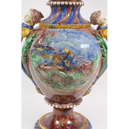 14 - Antique majolica vase with raised and applied decoration, 57cm high