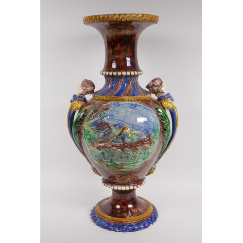 14 - Antique majolica vase with raised and applied decoration, 57cm high