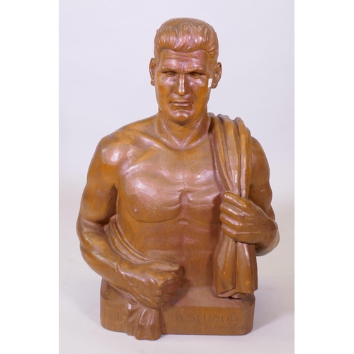 144 - An early C20th industrial style carved oak male bust, signed 'A Schaub, Sculpteur', 62cm x 36cm, 84c... 